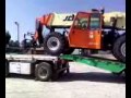Unloading a huge JLG Forklift